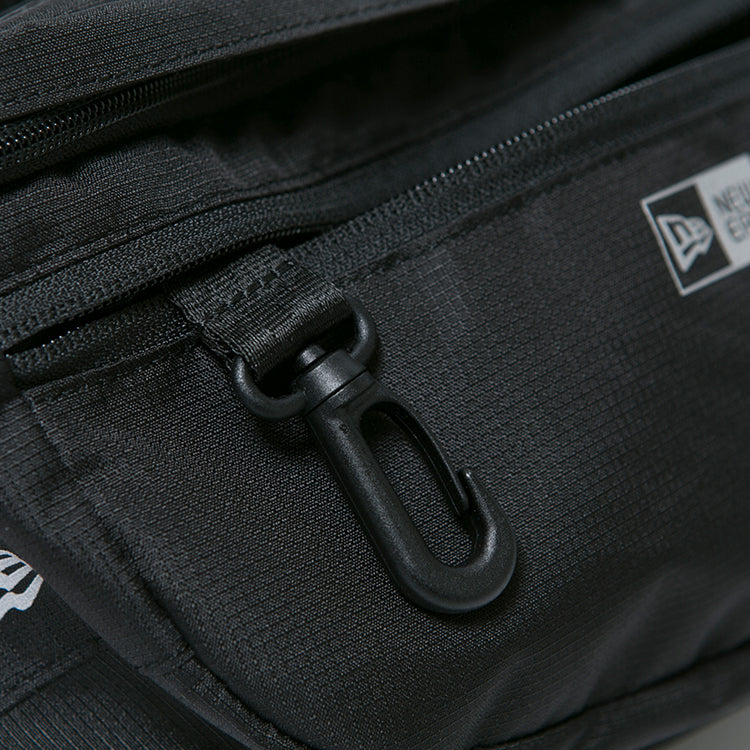 logo 3l black explorer waist bag 1 tag and close up