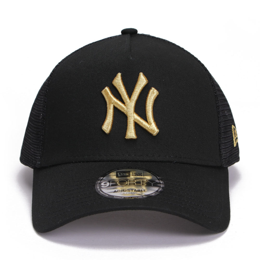 new era new york yankees essential black golf 9forty a frame trucker cap front and side