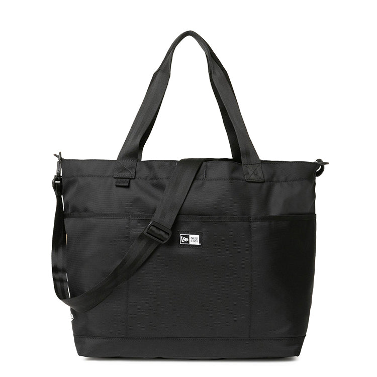 New Era basic black gym tote bag with  with dual top handles, an adjustable shoulder strap, and a small box logo on the front.