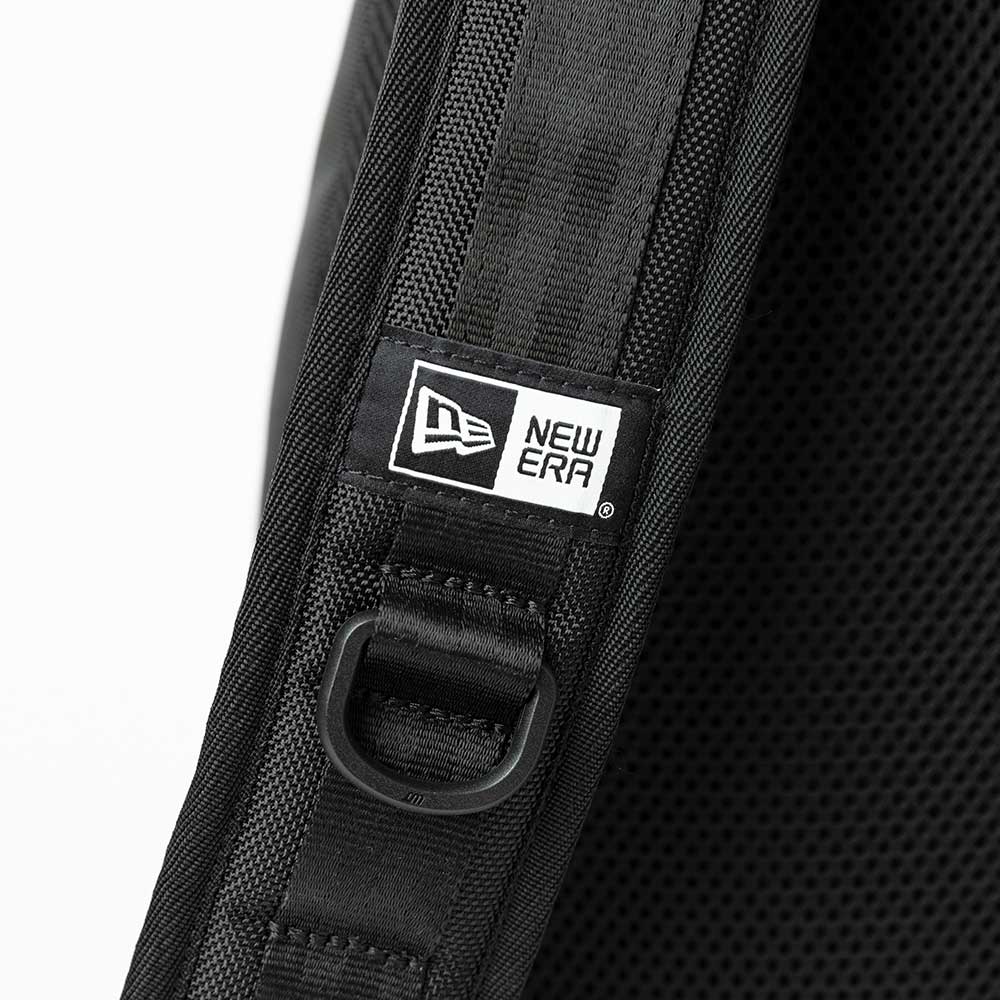 8l black sling body bag tag and close up