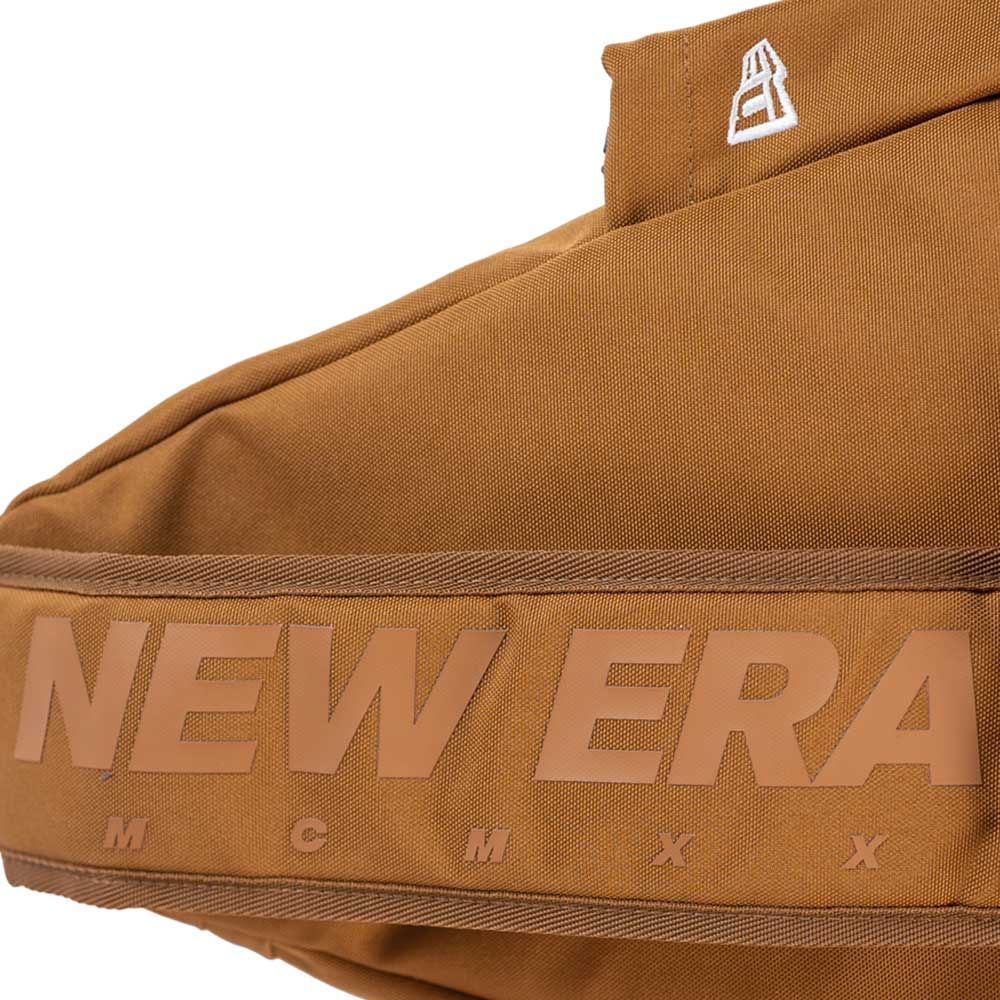 wordmark urban core khaki sling bag with print