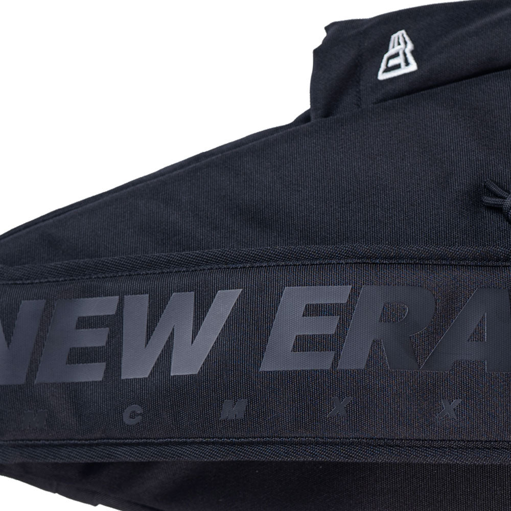 wordmark urban core black sling bag with print