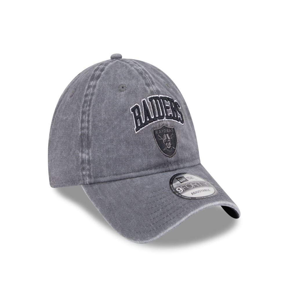 A gray washed baseball cap featuring the Oakland Raiders logo and 'Raiders' text embroidered on the front, with a New Era 9FORTY sticker visible on the brim.