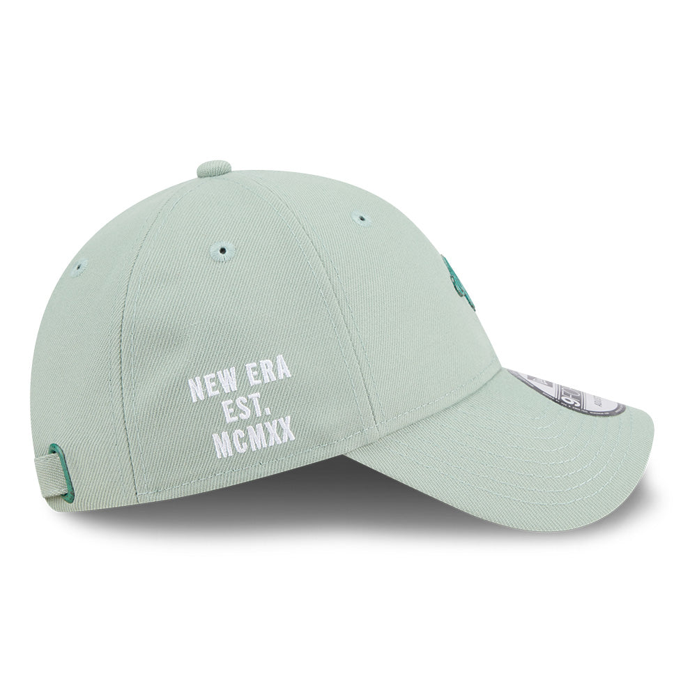 new era ne script metal bronze badge everest green 9forty unstructured adjustable cap angle