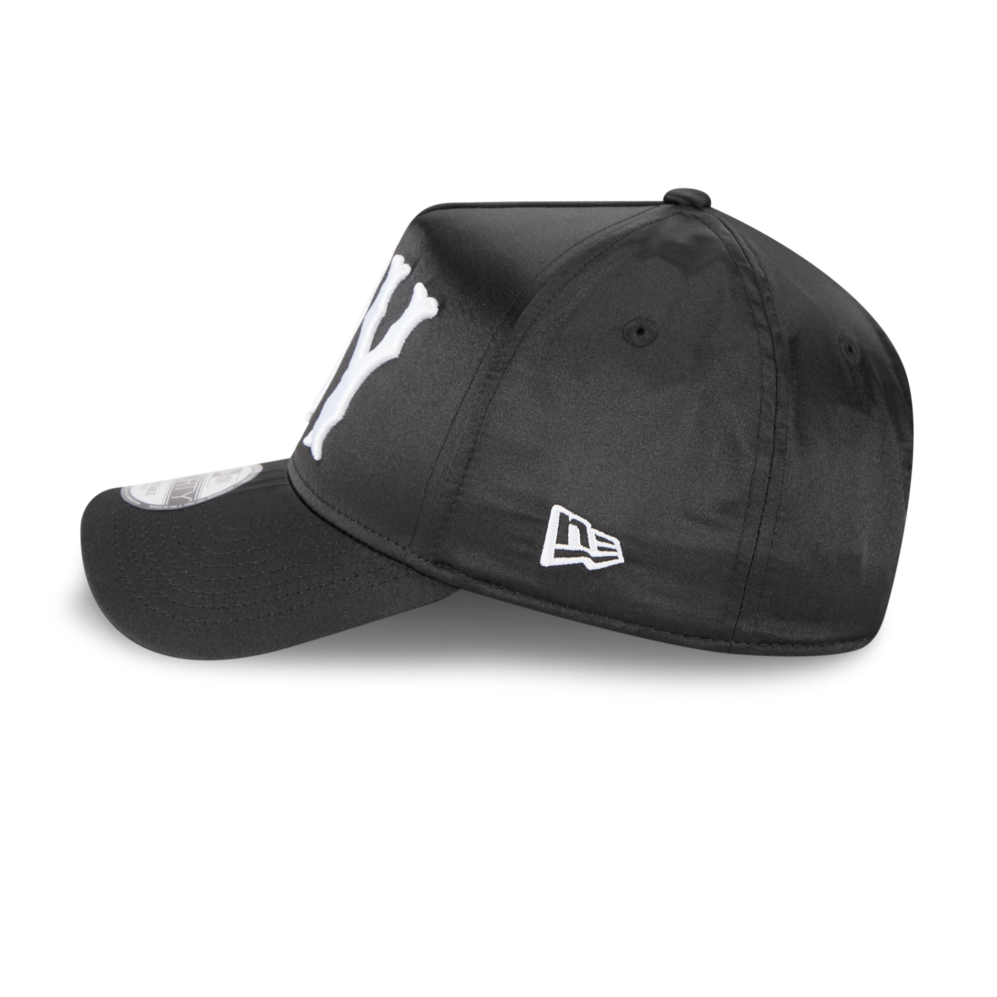 A black New Era baseball cap with a white embroidered New York logo on the front and a white New Era flag logo on the side, shown on a clean white background.