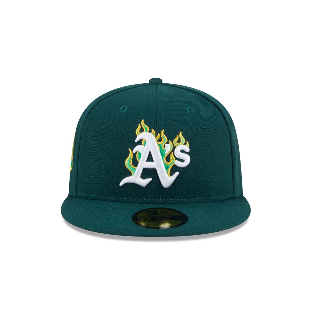 A dark green Oakland Athletics fitted cap featuring a white embroidered 'A's' logo with green and yellow flame details, shown against a plain white background.