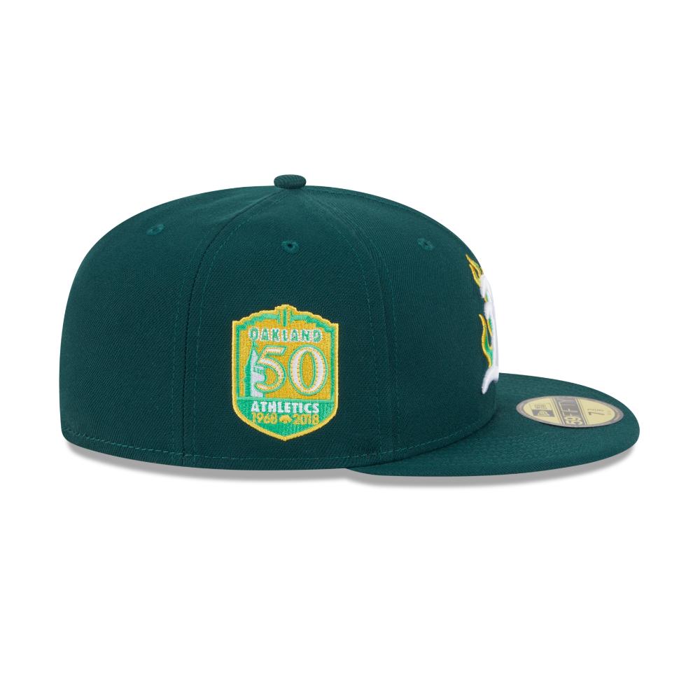 Green baseball cap with a logo on a white background