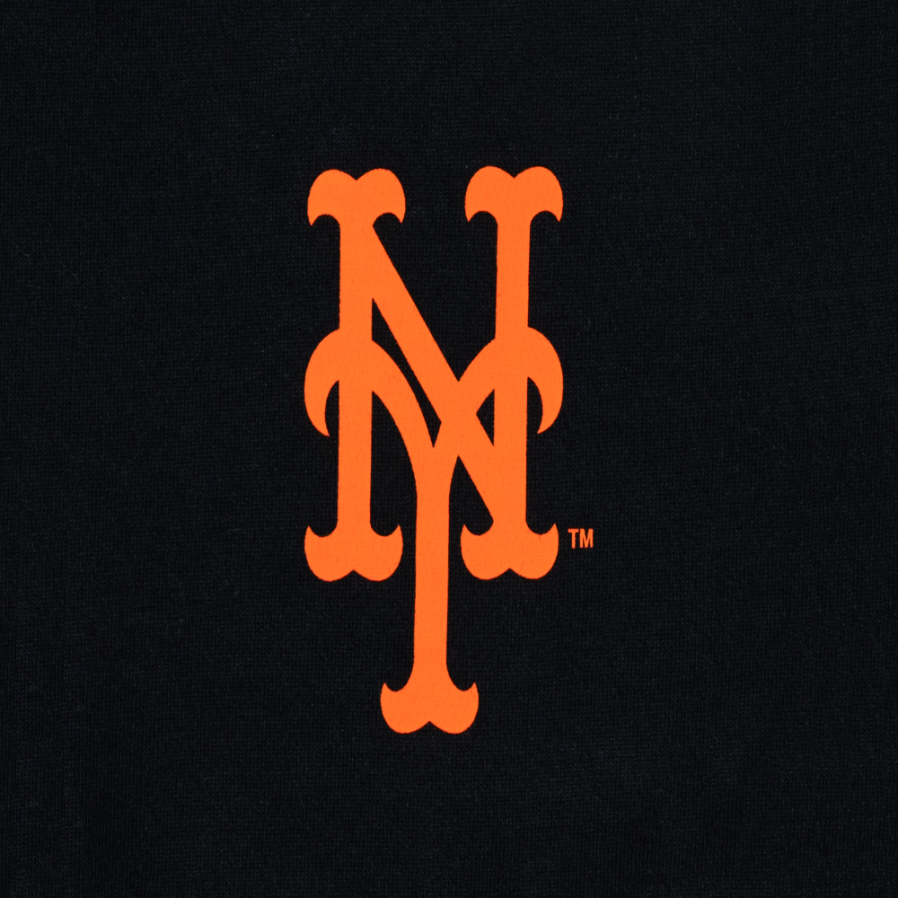 A close-up of a black textured fabric featuring a bold orange stylized 'NY' logo, likely representing the New York Yankees, with a small TM symbol next to it.
