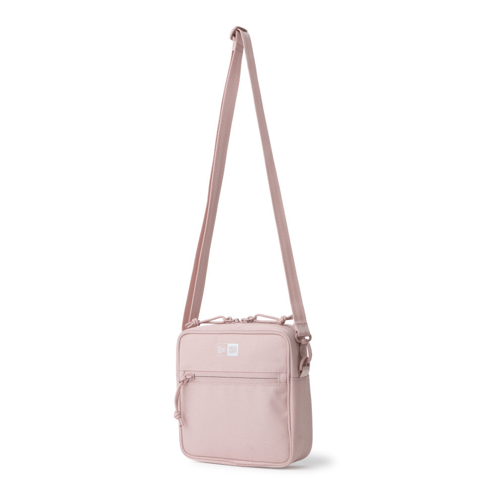 logo pink square shoulder pouch bag tag and close up