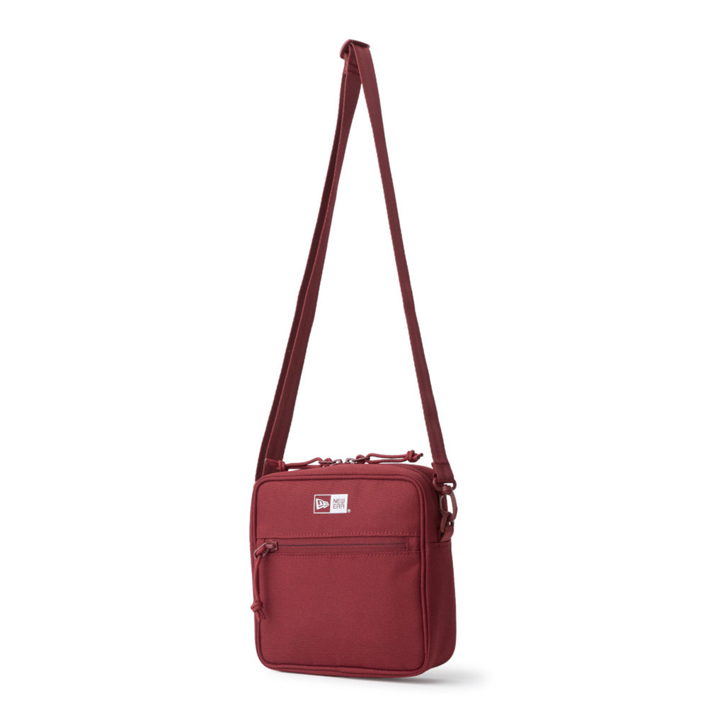 logo burgundy square shoulder pouch bag tag and close up