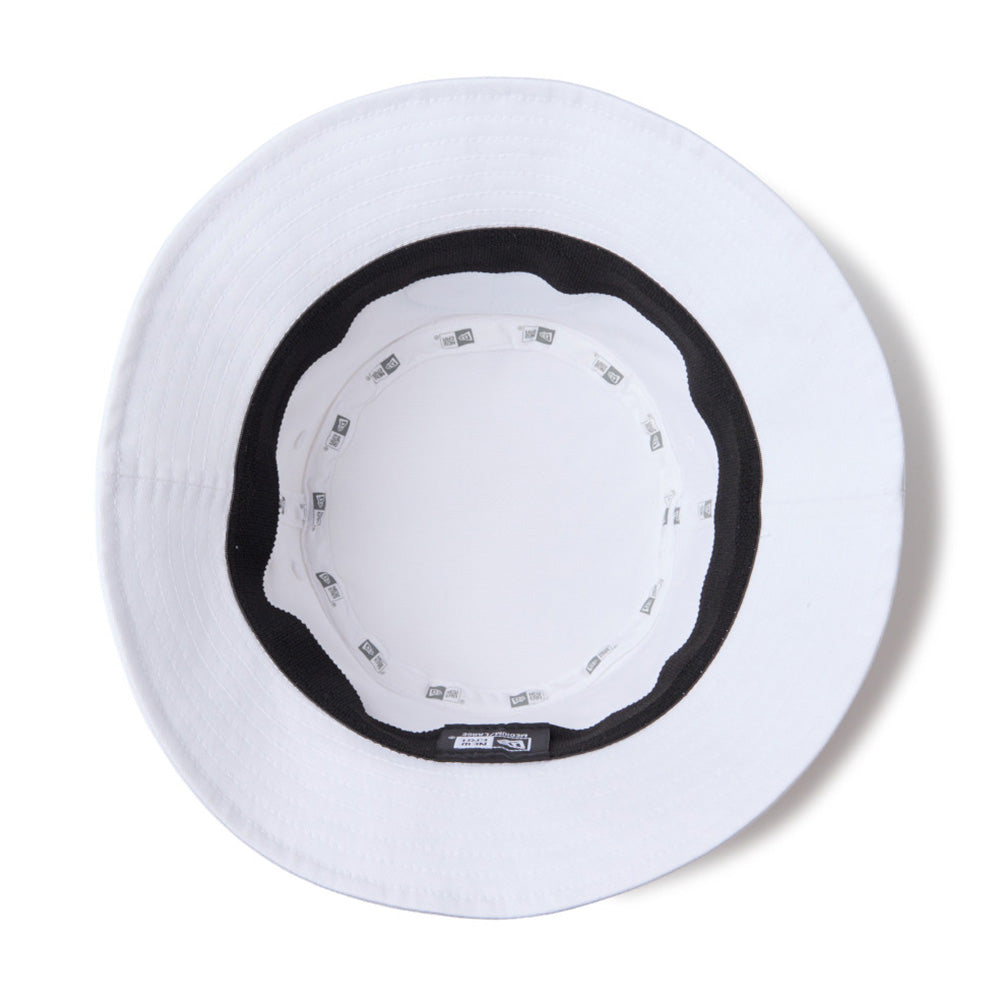 new era script oval patch white golf bucket hat under