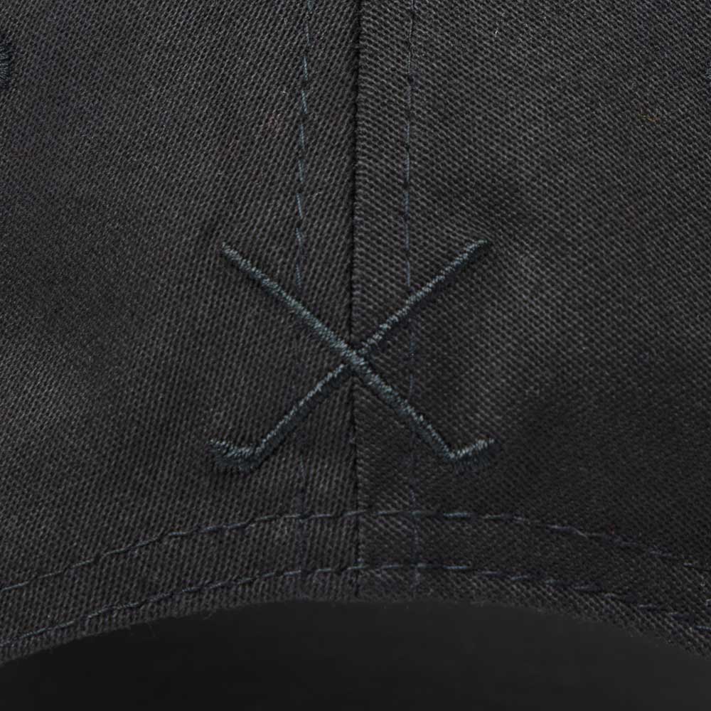 new era script oval patch black golf 9fifty stretch snapback cap close-up back view with an embroidered design