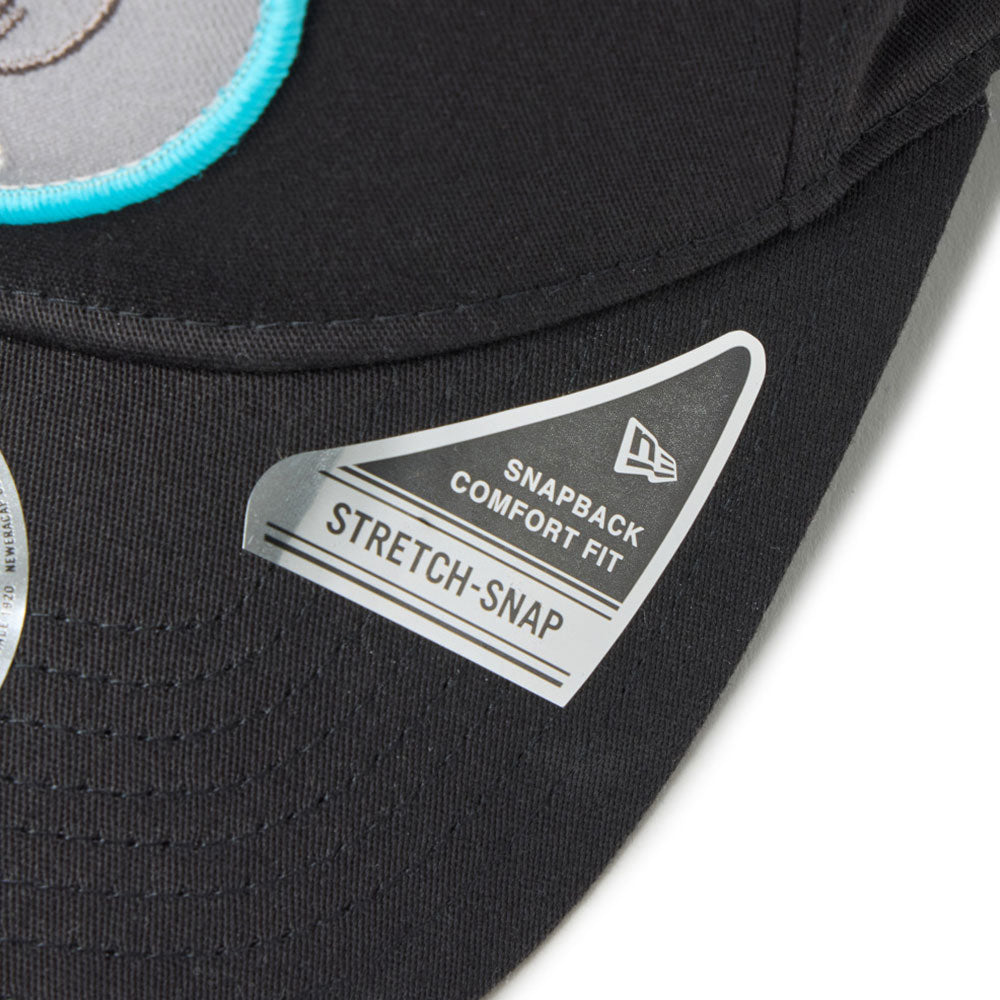 new era script oval patch black golf 9fifty stretch snapback  cap with a New Era Stretch-Snap label