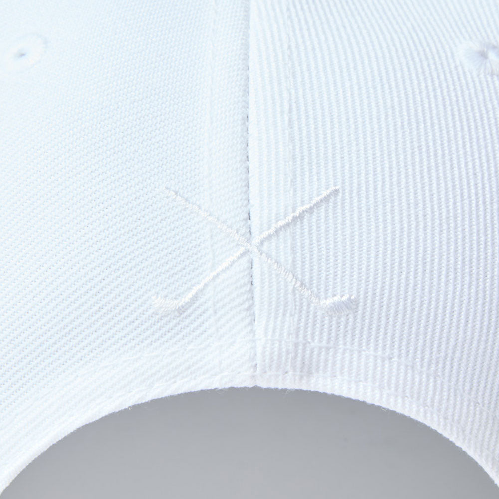 Close-up of a white textured fabric new era wordmark golf stencil logo white 9fifty snapback cap