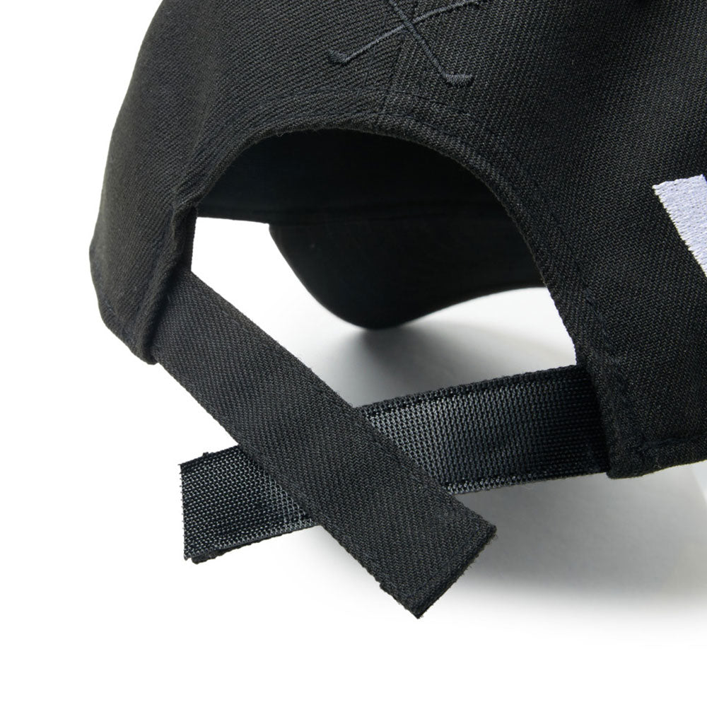 Close-up of adjustabke strap of new era wordmark golf stencil logo black 9forty cap