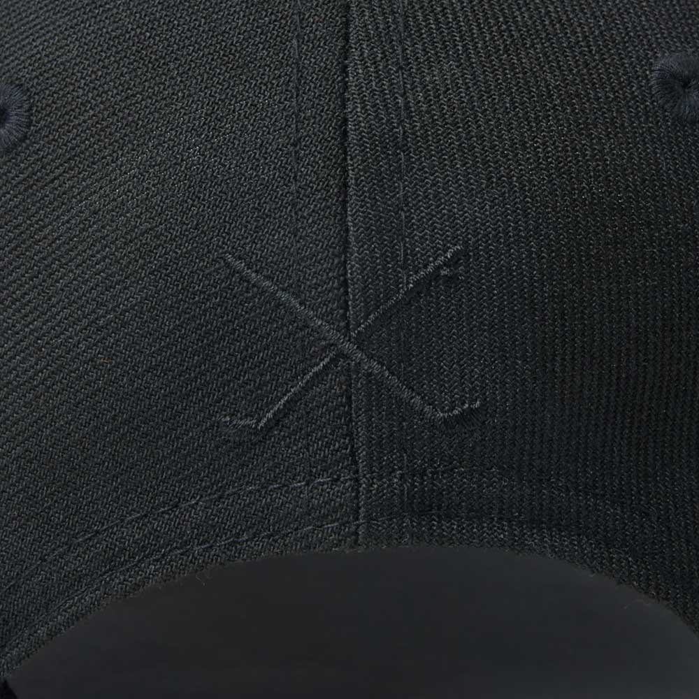 Close-up new era wordmark golf stencil logo black 9forty adjustable cap