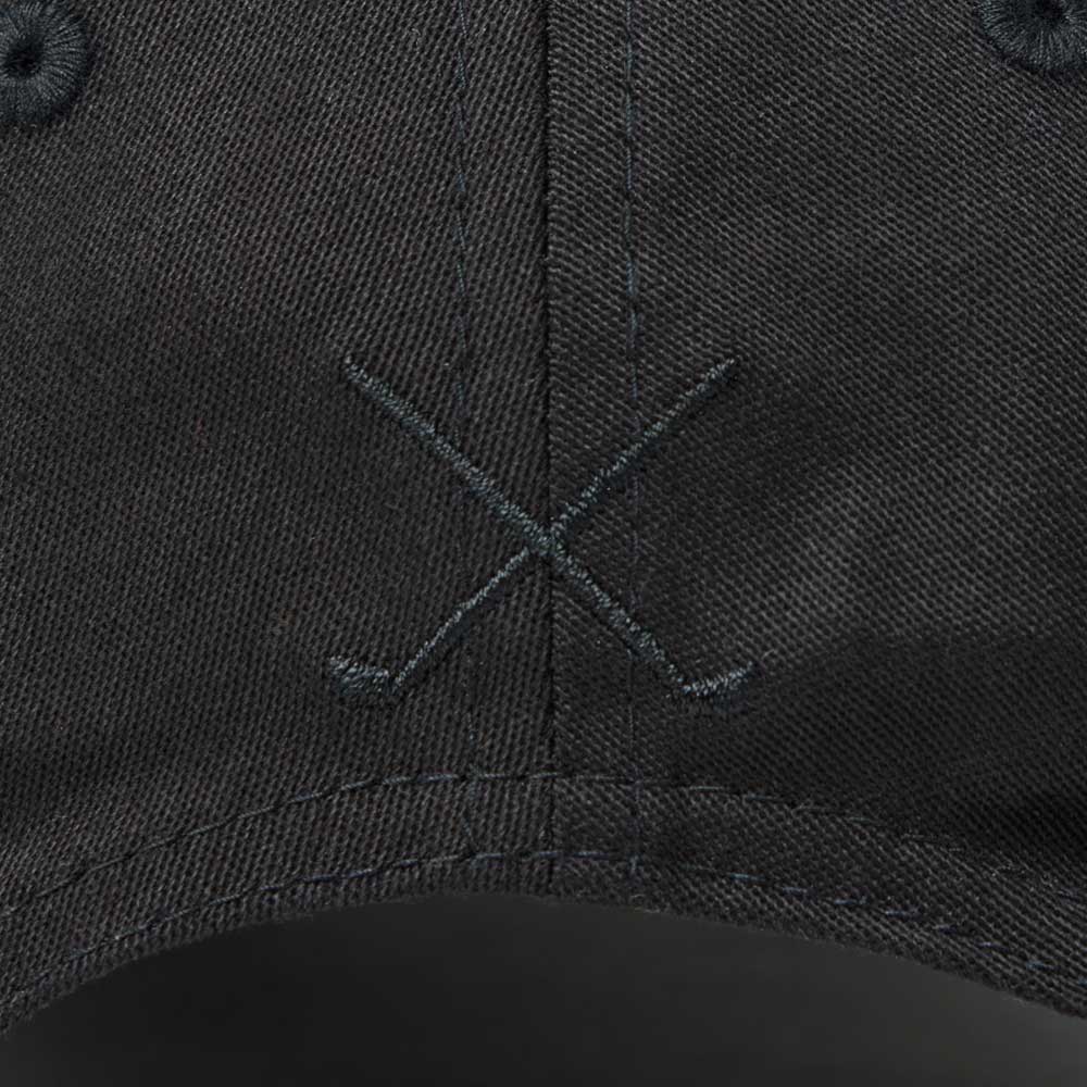 new era script oval patch black golf 9forty stretch snapback cap close-up back view with an embroidered design