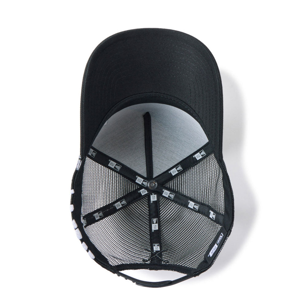 new era wordmark golf stencil logo black 9forty a frame trucker snapback cap opposite