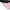Close-up of a baseball cap showing a light pink visor with white embroidered strawberry details, a black stitched edge, and a black interior.