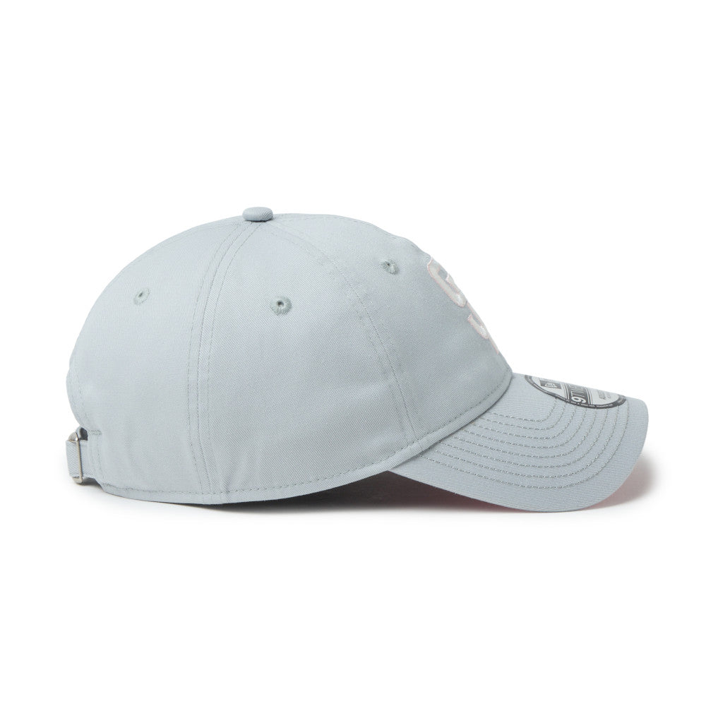 Light gray baseball cap on a white background