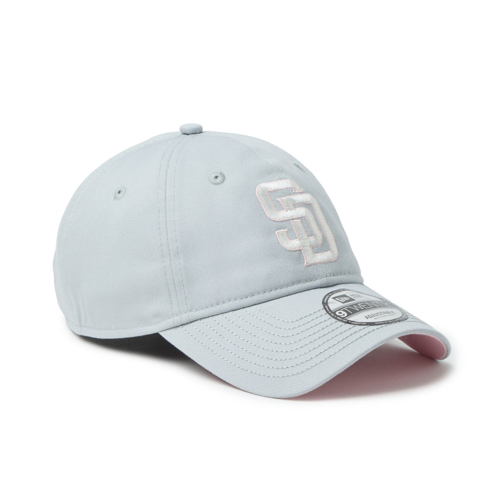 Light blue baseball cap with a logo on a white background