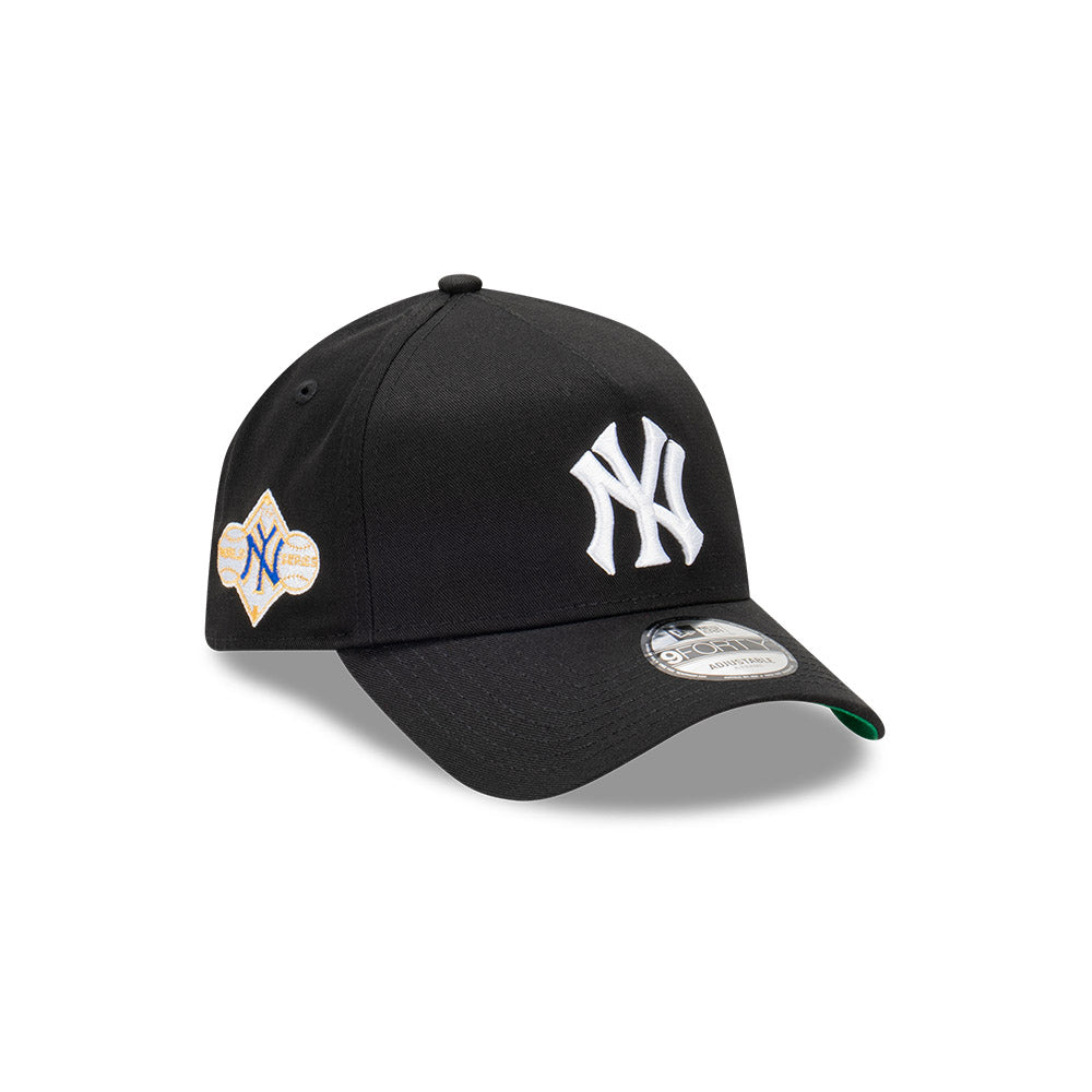 Black baseball cap with white logo on a white background