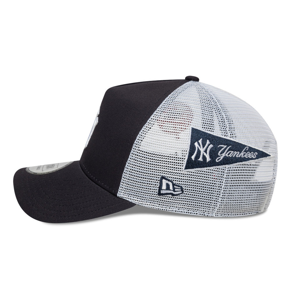 new era new york yankees multi patch navy white 9forty e frame trucker cap opposite side or other angle view