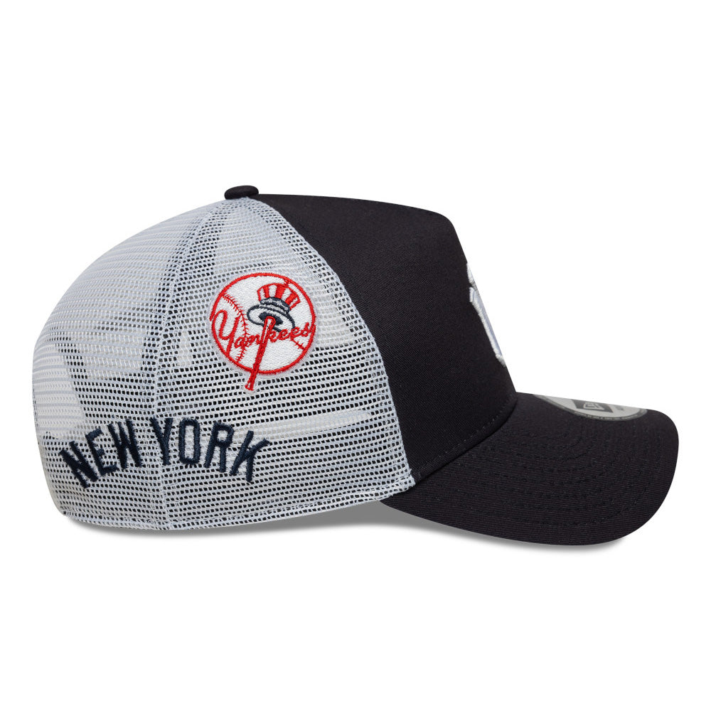 new era new york yankees multi patch navy white 9forty e frame trucker cap angle