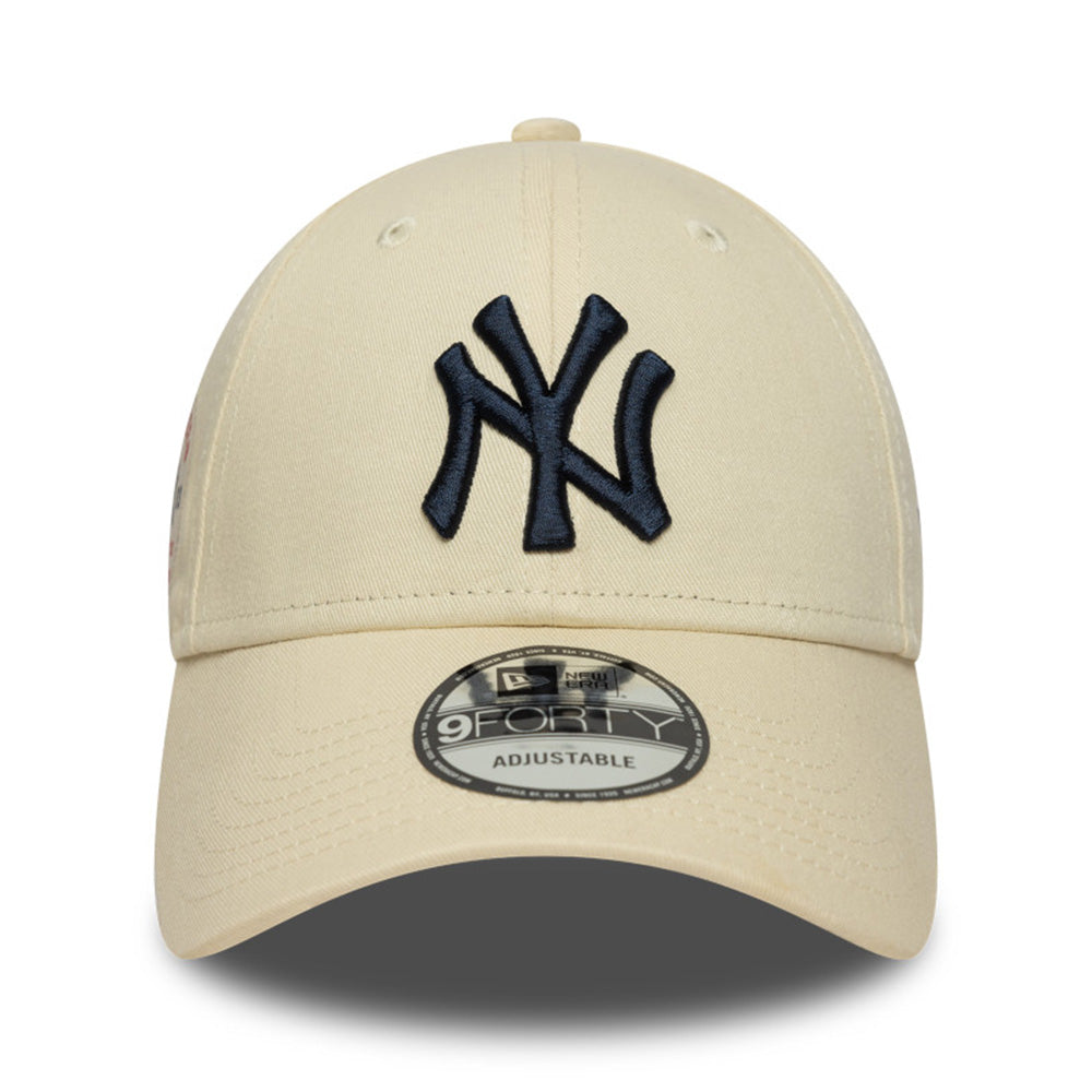 new era new york yankees side patch light cream 9forty adjustable cap logo and print