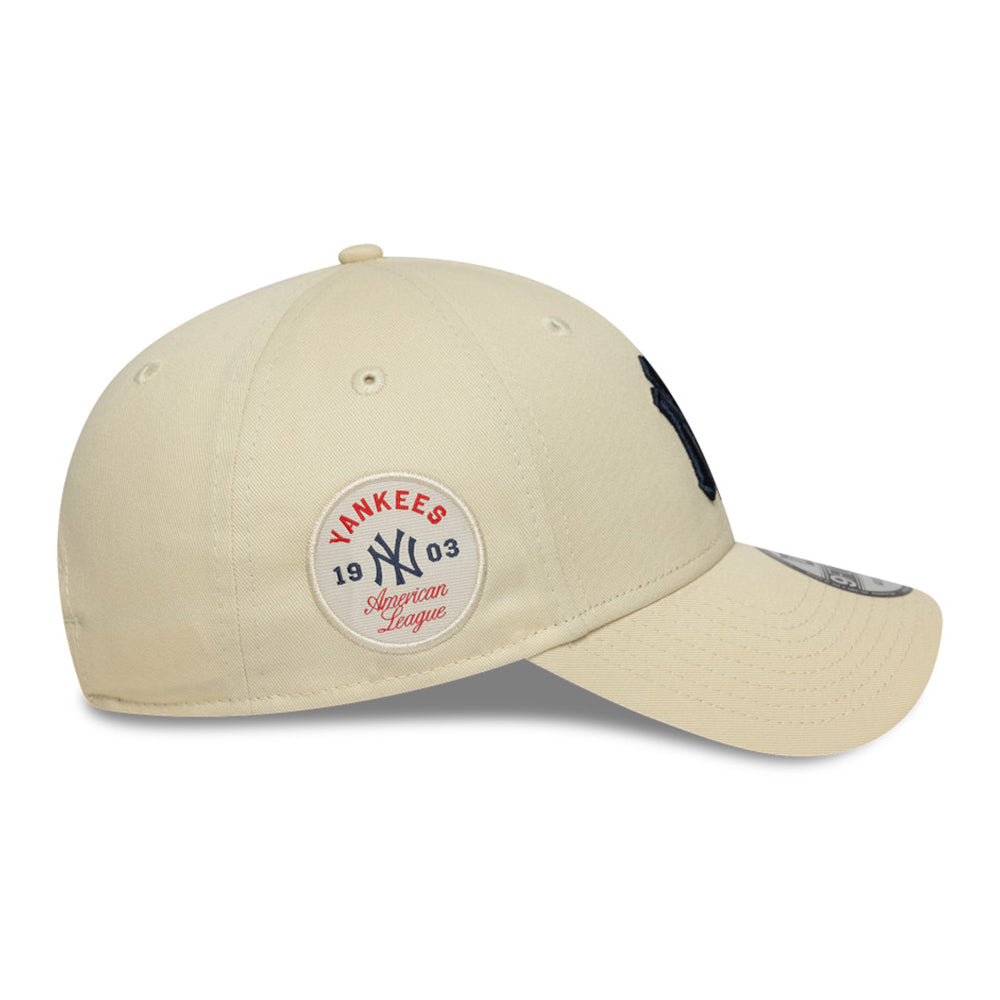new era new york yankees side patch light cream 9forty adjustable cap angle