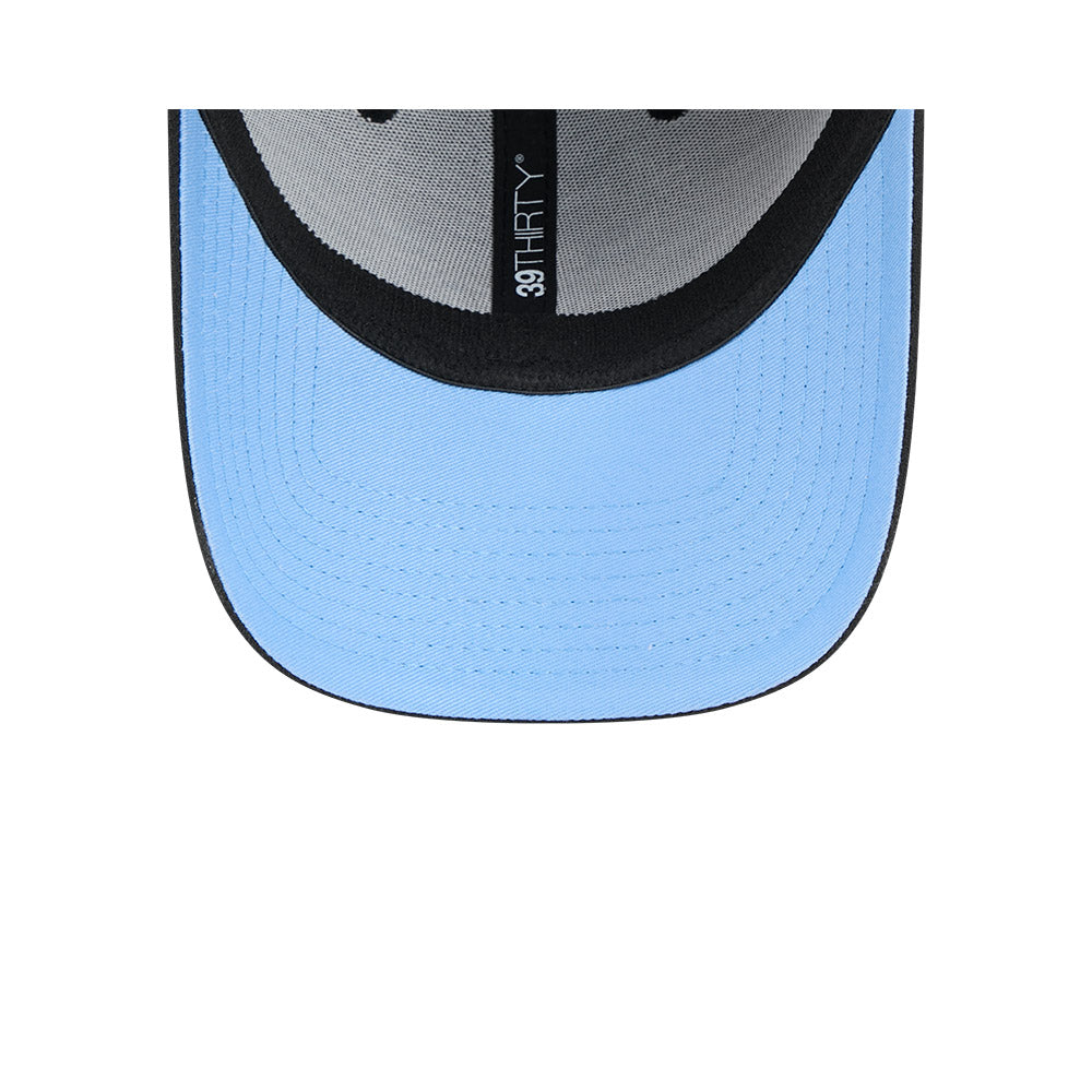 Close-up of a blue cap with a black rim and '39THIRTY' logo on a white background