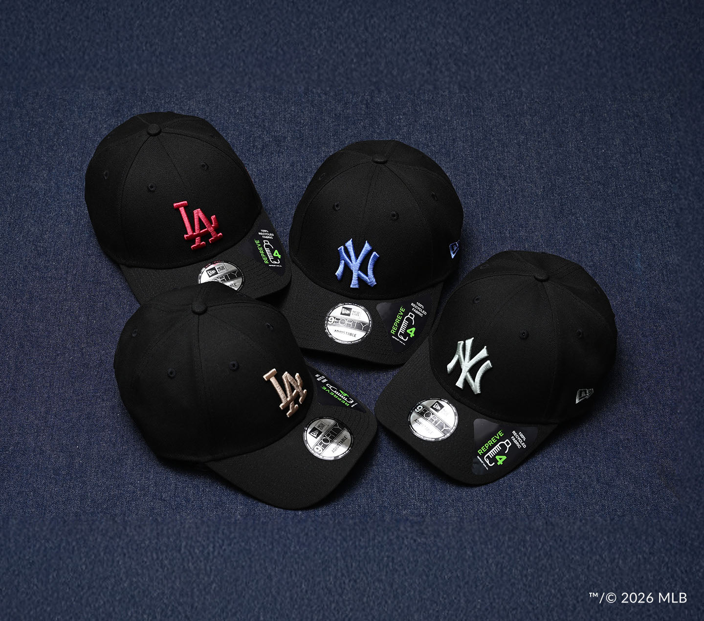 Four black baseball caps with repreve 100% recycled fabric sticker on a dark blue background